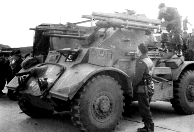 The turret of this Canadian 12th Manitoba Dragoons Staghound Armoured Car was fitted with four 60 lb RP-3 (Rocket Projectile 3-inch) air to ground aircraft rocket launcher rails in November 1944.