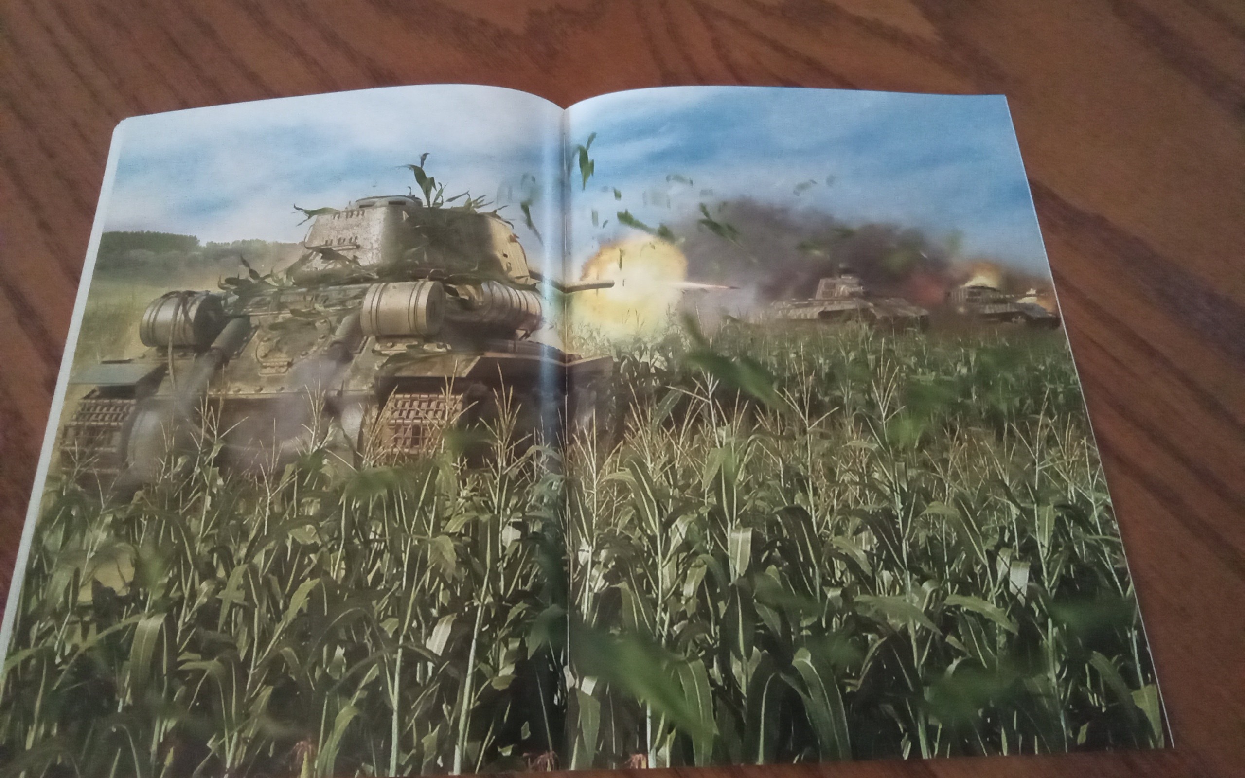 tanks playing catch in a corn field.