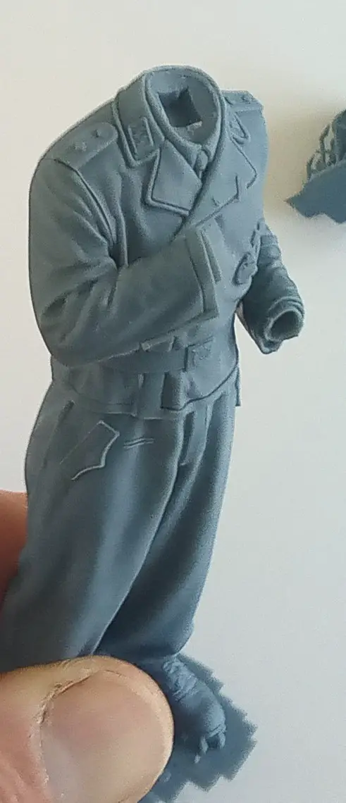 Commander with arms fitted, no glue. Notice button hole in the lapel and fob pocket in trouser.