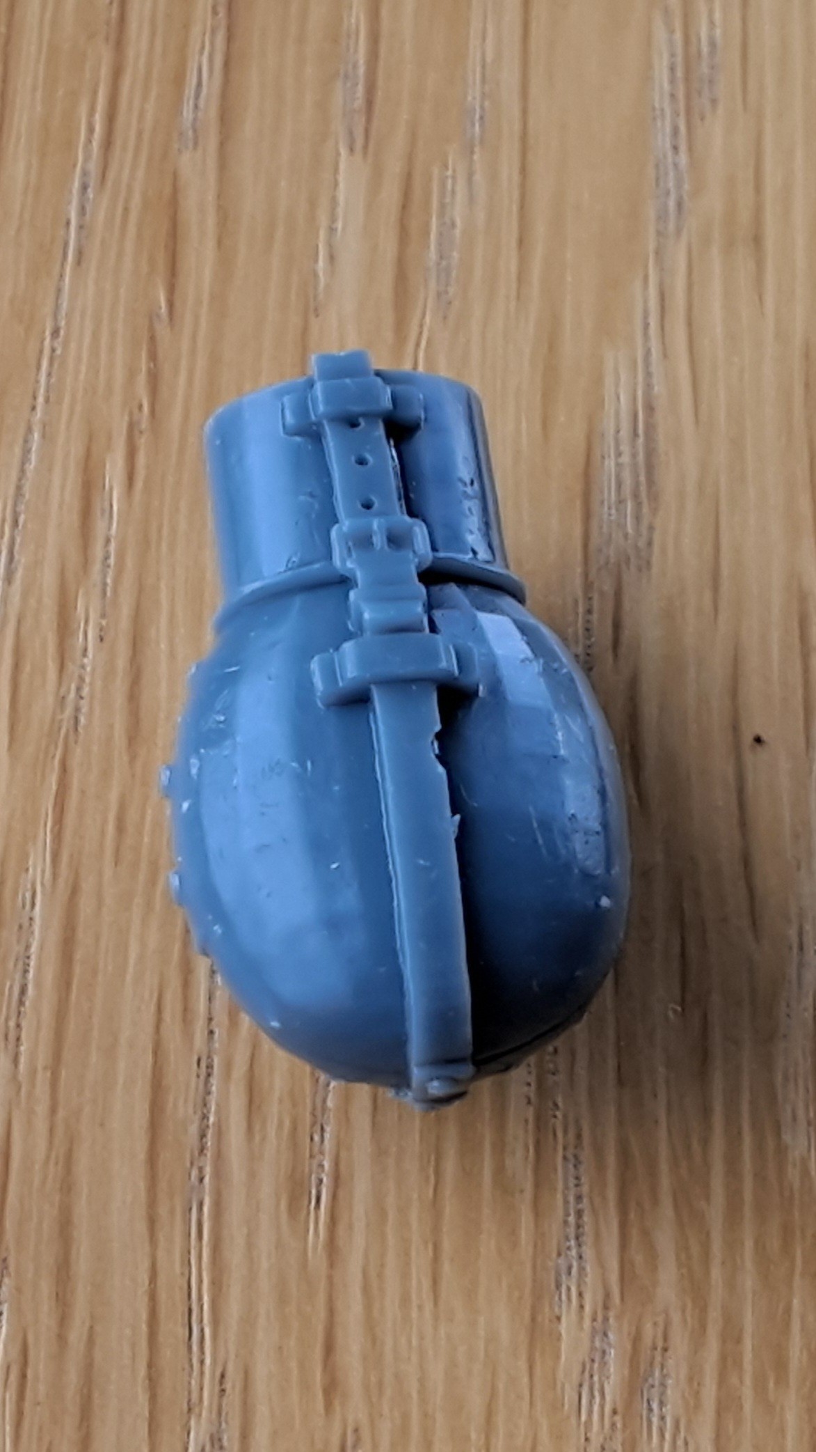 You can seen the 3D sculpt here, and the only bit of damage, the chip in the strap of the canteen.