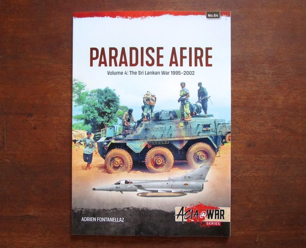 Cover: A Saracen APC captured by the LTTE during operation Unceasing Waves 3 in 1999 (LTTE)
