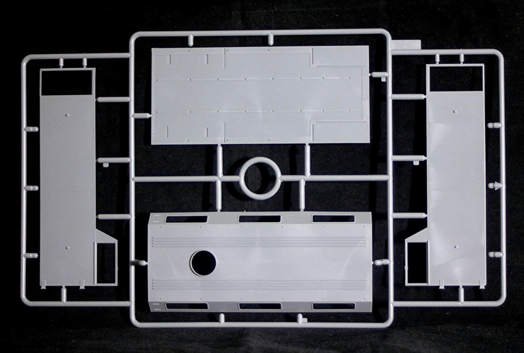 The truck body which would have fire fighting equipment in the front section and the Mechanised hose layer in the back section
