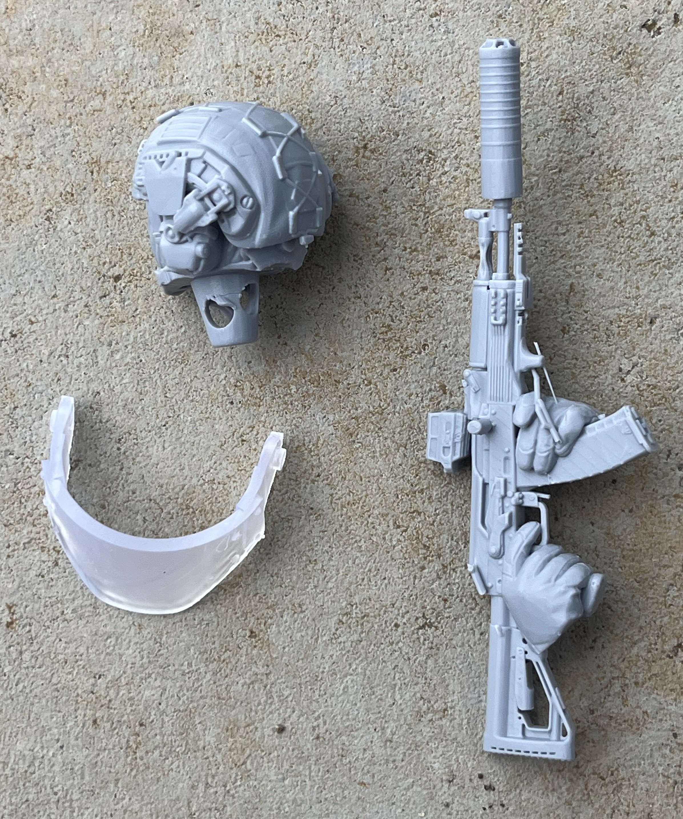 that is not my toenail with the head and rifle. Yes, the rifle is a little bent at the suppressor.