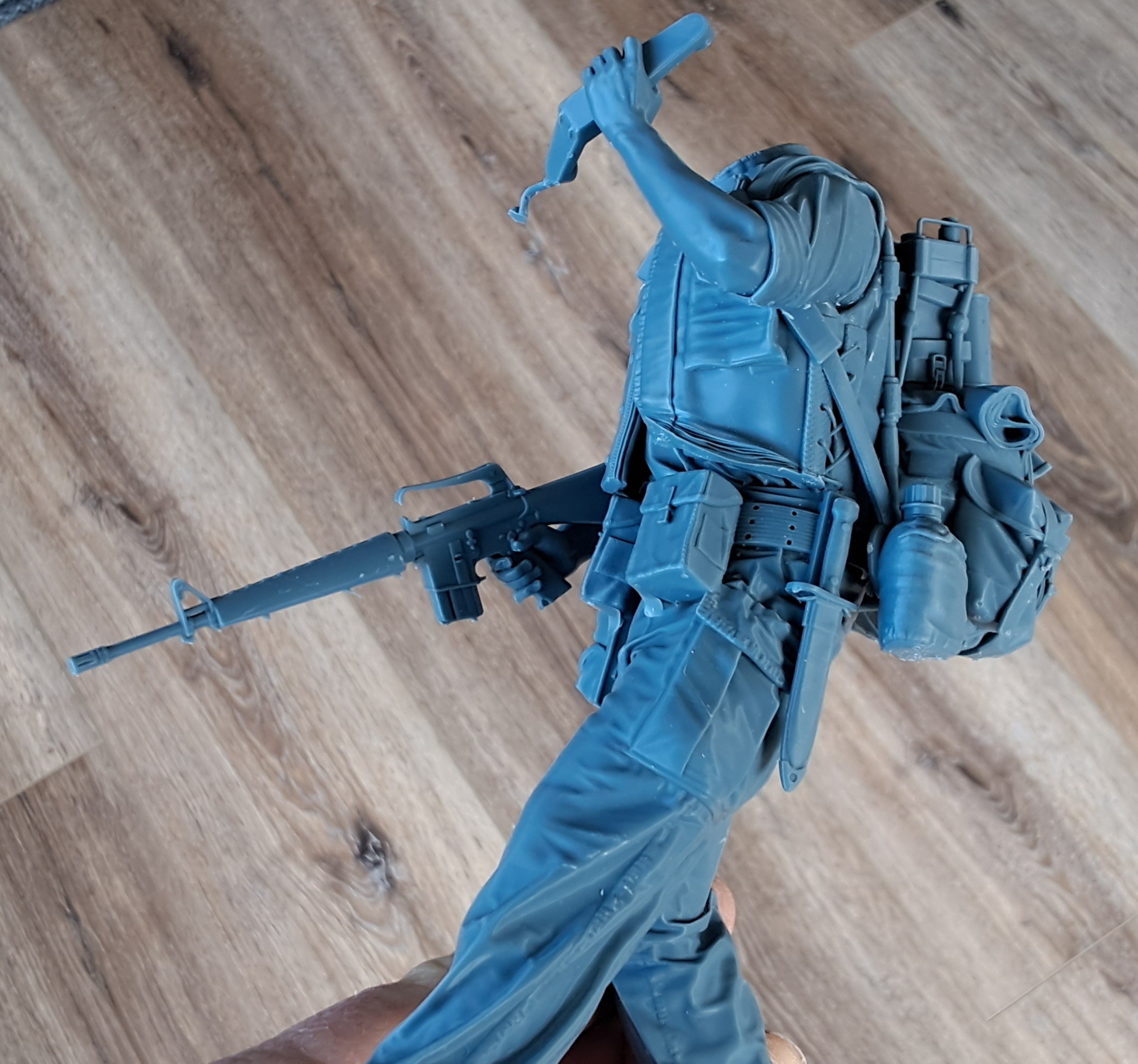 Note the layers coming apart on the jacket, and the rifle handle. The sling also came away cutting the frame