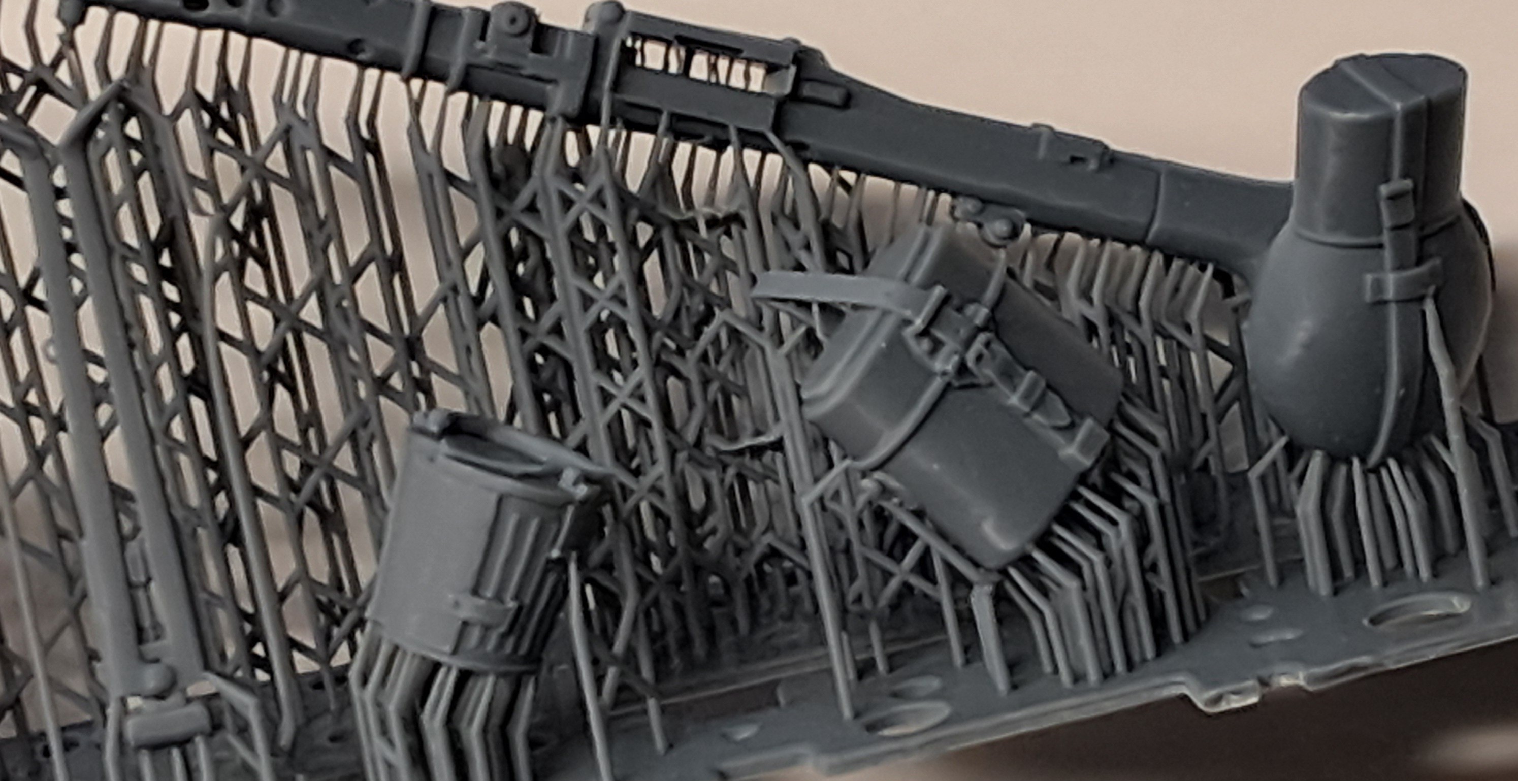 I will cut these free. Bipod to the left. Note the cleared chamber. No breadbag, though.